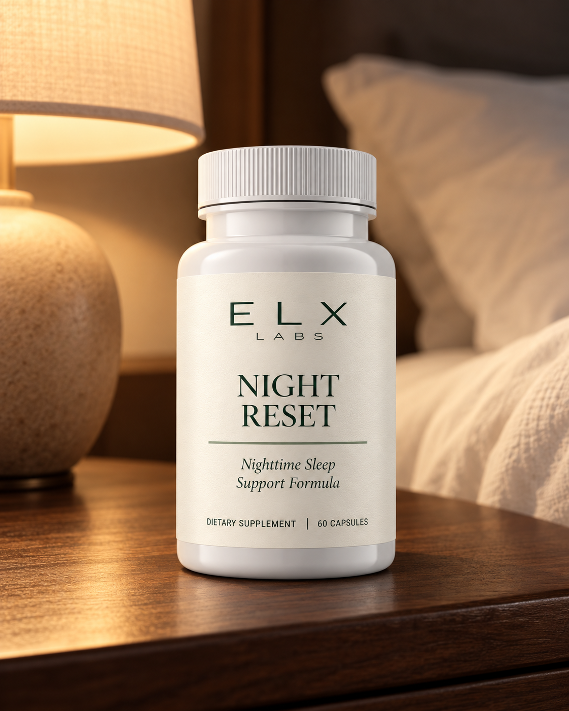 Night Reset bottle on a bedside table beside a lamp.